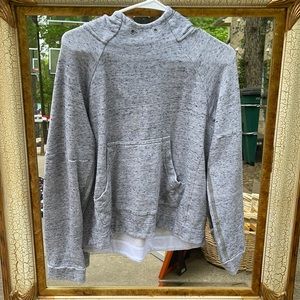grey sweatshirt